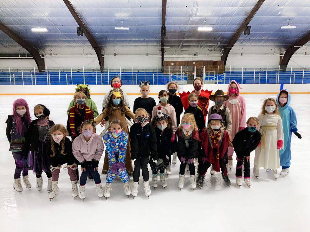 Winnetka Figure Skating Club posing in Halloween Costumes