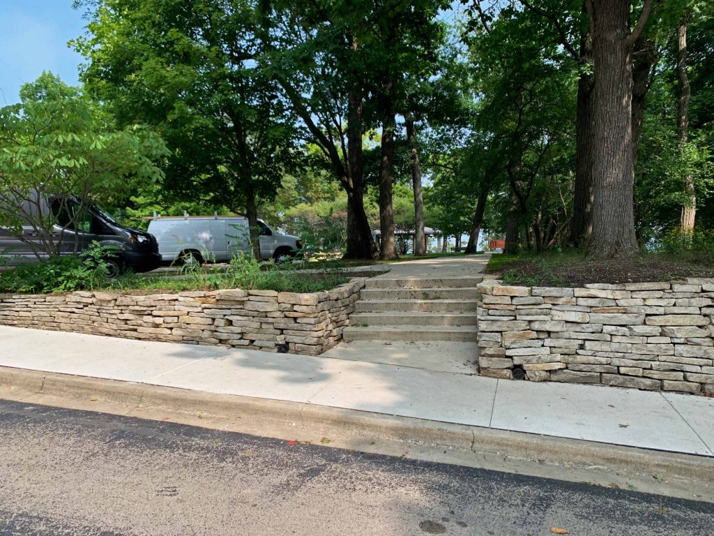 sidewalk and parking lot at Tower Road Park