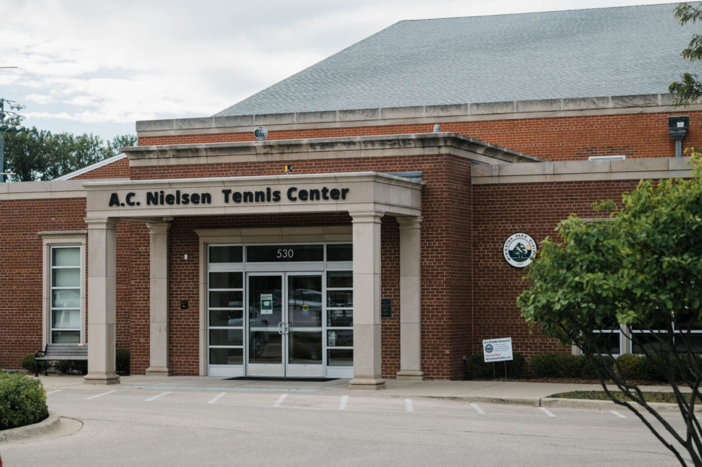 front entrance of the A.C. Nielsen Tennis Center